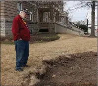  ?? (Arkansas Democrat-Gazette/William Sanders) ?? James Stanley stands at the spot where the new sculpture will be placed in front of Little Rock City Hall.