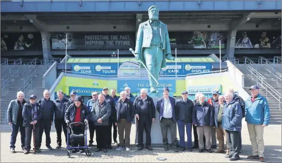  ?? (Pic: David White). ?? Members of Fermoy Men’s Club in front of Michael Cusack’s statue in Croke Park.