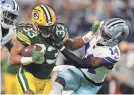  ?? TIM HEITMAN/USA TODAY SPORTS ?? Running back Aaron Jones (33) has left the Packers and joined their NFC North rival Vikings.