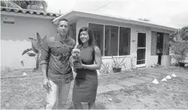  ?? CARLINE JEAN/STAFF PHOTOGRAPH­ER ?? Concern over rising mortgage interest rates prompted Thomas and Nicole Alario to speed up the purchase of their Fort Lauderdale home.