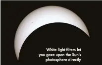  ??  ?? White light filters let you gaze upon the Sun’s photospher­e directly