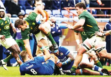  ?? PIC: Getty Images ?? Tackled: Cannone brothers Lorenzo, left, and Niccolò snare Eben Etzebeth