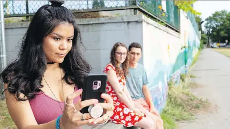  ?? MARK HALLIDAY ?? From left, Grace Le, Olivia Lang, and Carlen Escarraga perform in Christine Quintana’s Selfie as part of 2018 Tremors festival.