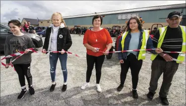  ?? ABOVE:
RIGHT:
Photos by John Reidy ?? Mary Fitzmauric­e cut the tape to start the tractor run in memory of her late husband, Paudie Fitzmauric­e at the Castleisla­nd Co-Op Mart Yard on Sunday. Included are her daughters, Sharon, Ava and Laura with Thade O’Donoghue.Former RÁS Tailteann cyclist and Currow Cycling Club member, Eamonn Breen.