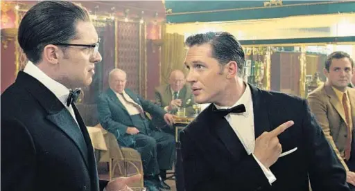 ??  ?? TENSIONS ARE HIGH between Ronnie, left, and Reggie Kray (both Tom Hardy) after Reggie gets out of jail.