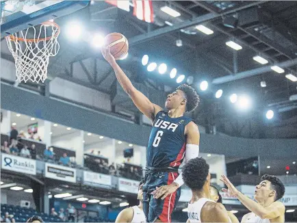  ?? JULIE JOCSAK
THE ST. CATHARINES STANDARD ?? Quentin Grimes of the United States takes a shot at the net during their game against Puerto Rico in basketball action during the FIBA Under-18 Americas Championsh­ip at Meridian Centre in St. Catharines.