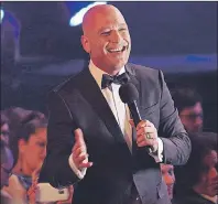  ?? CP PHOTO ?? Howie Mandel is shown wandering into the crowd during the opening of the 2017 Canadian Screen Awards in Toronto earlier this year.