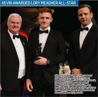  ??  ?? Sligo hurler Kevin Banks from Coolera/ Strandhill is presented with his Lory Meagher Champion 15 award by Uachtarán Chumann Lúthchleas Gael Aogán Ó Fearghail, left, and David Collins, GPA President, during the PwC All Stars 2017 at the Convention...