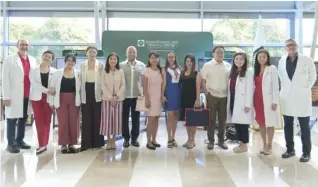  ?? ?? Group photo of the organizers and exhibiting artists of “Love and Nature 2.0 In The Healthcare System Art Exhibition”, organized by the AHMC Department of Surgery in collaborat­ion with VCA, which ran from February 12 -29 at Asian Hospital and Medical Center