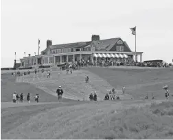  ??  ?? A general view of the clubhouse is seen from the first fairway during Monday’s practice round ahead of the 118th U.S. Open at Shinnecock Hills.