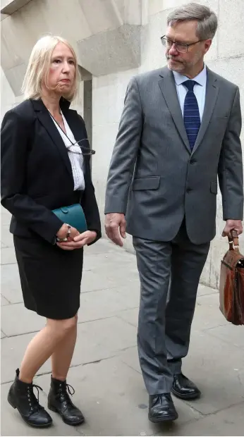  ??  ?? Accused: John and Sally Letts arrive for the start of their trial yesterday over sending money to their son Jack, inset