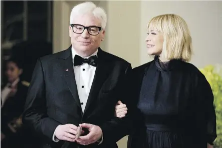  ?? ANDREW HARNIK/THE ASSOCIATED PRESS/FILES ?? Canadian comedian and actor Mike Myers, seen with his wife Kelly, has written a dramatic series for HBO that could be his return to television.