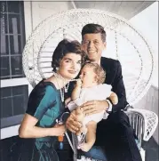  ??  ?? This charming image of the photogenic Kennedy family is featured in the Booth Western Art Museum exhibition “Creating Camelot: The Kennedy Photograph­y of Jacques Lowe.”