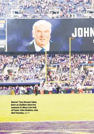  ?? GETTY ?? Ravens’ Tyus Bowser takes knee as stadium observes moment of silence for Hall of Famer John Madden, who died Tuesday.