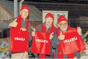  ??  ?? ECO AWARE: On World Environmen­t Day many brought in plastics to exchange for a reusable Isuzu shopping bag. Pictured are manufactur­ing area managers, from left, Etienne Venter, Wynand Moller and Hamilton de Beer