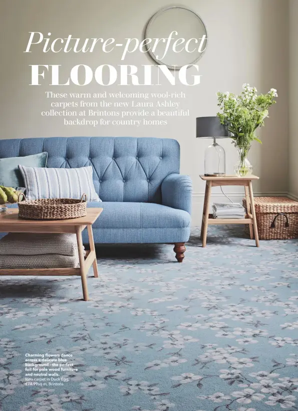  ??  ?? Charming flowers dance across a delicate blue background - the perfect foil for pale wood furniture and neutral walls. Iona carpet in Duck Egg, £74.99sq m, Brintons