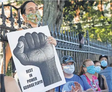  ?? SOPHIA GERMER/ AP ?? Protesters gather at Jackson Square and Washington Artillery Park in New Orleans on June 5 after the death of George Floyd at the hands of Minneapoli­s police.