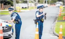  ?? Photo / Michael Craig ?? Police cordoned off Avis Ave, in Papatoetoe, ahead of Thursday’s fatal shooting.