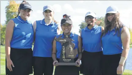  ?? KEN SWART — FOR MEDIANEWS GROUP ?? The Eisenhower Eagles show off the hardware after they won the Division 1regional tournament at Cherry Creek Golf Club in Shelby Township on Wednesday. Troy Athens placed second and Stoney Creek third as all three teams advanced to the state finals.