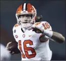  ?? The Roanoke Times via AP photo ?? Trevor Lawrence did not play in Clemson’s 47-40 overtime loss to Notre Dame last month due to COVID-19.