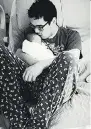  ?? FACEBOOK ?? Brandon Calahoo holds his girlfriend’s infant daughter Raelyn Supernant.