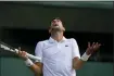  ?? ALASTAIR GRANT — THE ASSOCIATED PRESS ?? Novak Djokovic reacts as he plays Jannik Sinner in a men’s singles quarterfin­al at Wimbledon in London on July 5.