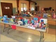  ?? HARRISON OTTO — FOR DIGITAL FIRST MEDIA ?? Schwarzwal­d Lutheran Church, along with other local organizati­ons, collected more than 2,000 toys for families in need in the Exeter area.