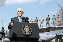  ?? SHAKH AIVAZOV/AP ?? Vice President Mike Pence took a harder line with Russia while visiting Tbilisi, Georgia.
