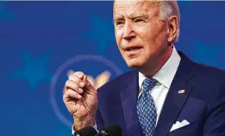  ?? Joshua Roberts / Getty Images ?? President-elect Joe Biden addresses a number of issues Tuesday at a news conference, calling the $900 billion pandemic aid bill a start but insisting on more economic relief in 2021.