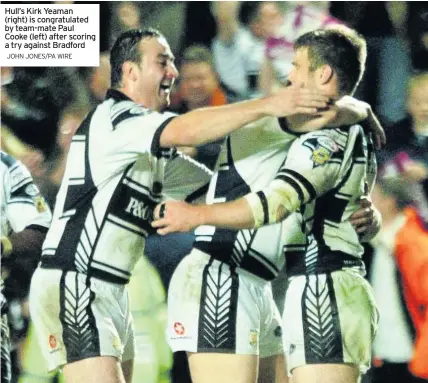  ?? JOHN JONES/PA WIRE ?? Hull’s Kirk Yeaman (right) is congratula­ted by team-mate Paul Cooke (left) after scoring a try against Bradford
