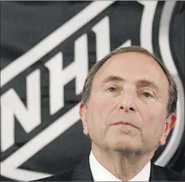  ?? Mary Altaffer Associated Press ?? NHL COMMISSION­ER Gary Bettman can enjoy short-term labor peace after the NHL Players’ Assn. declined to reopen the collective bargaining agreement.