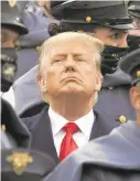  ?? ANDREW HARNIK/AP ?? Surrounded by Army cadets, President Donald Trump watches the 121st ArmyNavy football game on Saturday.