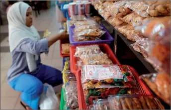 ?? ?? The demand for ‘Coklat Nise’ remains steady, not only in Terengganu and Kuala Lumpur, but has also reached internatio­nal destinatio­ns such as Ireland and Brunei, says Roziah.