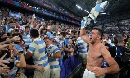  ?? ?? Argentina's Emiliano Boffelli celebrates with supporters after beating Wales. Photograph: Pavel Golovkin/AP