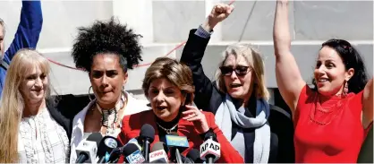  ??  ?? ‘Justice has been done’: Attorney Gloria Allred with Cosby’s accusers after the conviction