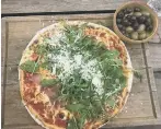  ??  ?? The prosciutto di Parma pizza.