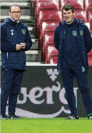  ?? REUTERS ?? Martin O’Neill and Roy Keane keeping a watchful eye on their players during training at the Telia Parken Stadion in Copenhagen last night