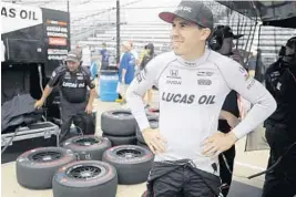  ?? DARRON CUMMINGS/AP ?? Robert Wickens, of Canada, waits in the pits before a practice session for the Indianapol­is 500 on Monday. He would damage his car in a crash, adding to Schmidt team’s troubled weekend.