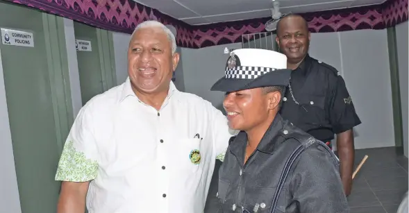  ?? Photo: Ronald Kumar ?? Prime Minister Voreqe Bainimaram­a and Police Constable Unaisi Duri of Nayavu Police Post, Wainibuka, during its opening on August 14, 2020.