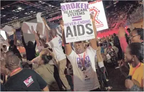  ??  ?? Visitors to the ICC protested before the official opening of the 2016 Internatio­nal Aids Conference. The government has done a complete turnaround on HIV, but some feel that not enough is being done.