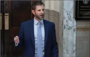  ?? (AP/Craig Ruttle) ?? Eric Trump addresses journalist­s Friday after leaving the courtroom during the civil fraud trial against his father, former President Donald Trump, at New York Supreme Court in New York.