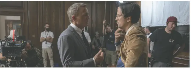  ?? PHOTOS: MGM ?? No Time to Die writer-director Cary Joji Fukunaga, right, wanted to make sure audiences see different sides
of James Bond in Daniel Craig’s final outing as the British spy.