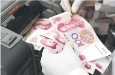  ??  ?? China’s central bank governor said yesterday the yuan should be ‘relatively stable’ this year after losing seven per cent of its value in 2016 amid accusation­s by US President Donald Trump of currency manipulati­on. — Reuters photo
