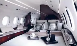  ??  ?? BELOW: Seating converted into a double bed in a Dassault Falcon 8X