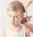  ??  ?? MAKING THE CUT: Be sure both you and your child are prepared before you attempt a home haircut. Pictures: iStock