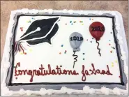  ?? EVAN BRANDT — MEDIANEWS GROUP ?? There was a tasty graduation cake waiting for Pottsgrove High School senior JaSaad Jamison after his special graduation ceremony Thursday.