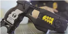  ?? APFILEPHOT­O ?? STUN GUN: Axon Enterprise Inc., maker of this Taser X26 and other devices, said yesterday that at least 15 people have caught fire, with five dying, after being stunned by one of its weapons.