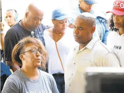  ?? JOE RAEDLE/GETTY IMAGES ?? Relatives of Elijah Clayton address the media after he was killed during a shooting at a video game tournament in Jacksonvil­le, Fla., on Sunday. David Katz, the suspect in the case who took his own life, according to officials, was raised in Columbia.