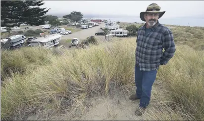  ?? PHOTOS BY SHERRY LAVARS — MARIN INDEPENDEN­T JOURNAL ?? Lawson’s Landing co-owner Mike Lawson looks out to the ocean from a bluff at Lawson’s Landing in Dillon Beach. The California Coastal Commission approved a wastewater system permit for the privately owned seaside resort at the mouth of Tomales Bay.