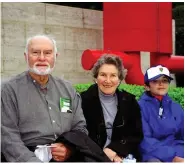  ?? (Special to The Commercial) ?? Edmond Freeman sits with his wife, June, and their grandson Isaac while on a trip to Japan in 2000.